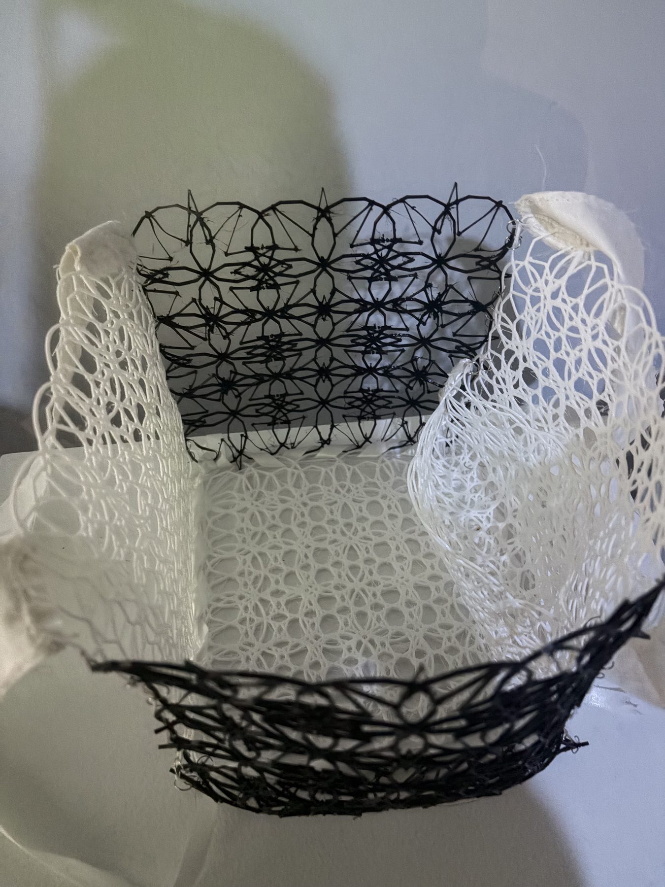 Close-up of the 3D-printed lace pocket inside the Eternal Purse